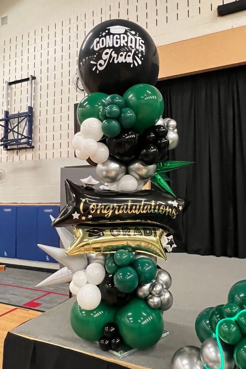 Green Balloon Tower for Graduation Celebration with Star-Shaped and Printed Balloons | Majestic Balloons | Cambridge, Ontario