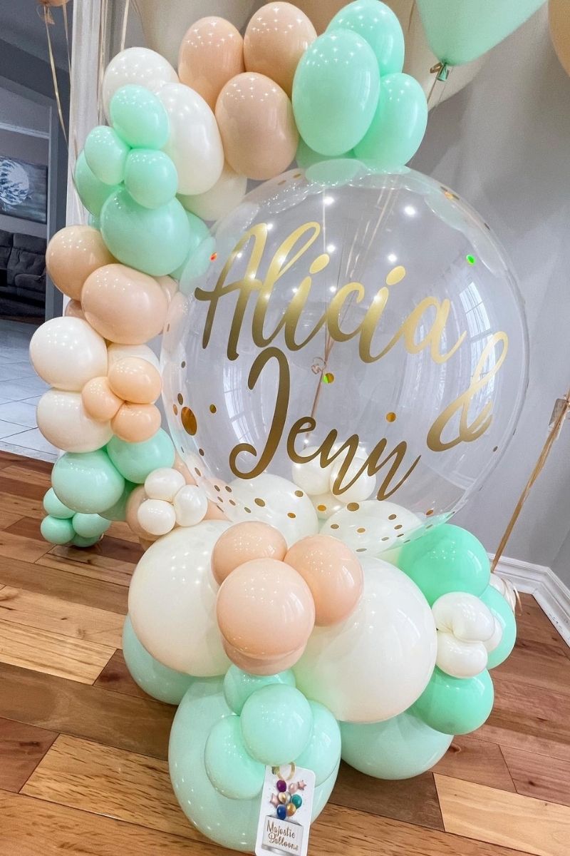 Message Balloon Surrounded by Pastel Colour Balloons with Butterfly Decorations | Majestic Balloons | Cambridge, Ontario