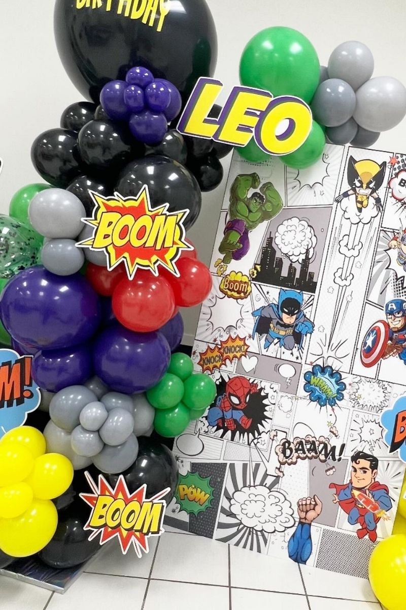 Comic-Themed Cardboard Cutout with Comic-Themed Balloon Garland | Majestic Balloons | Cambridge, Ontario