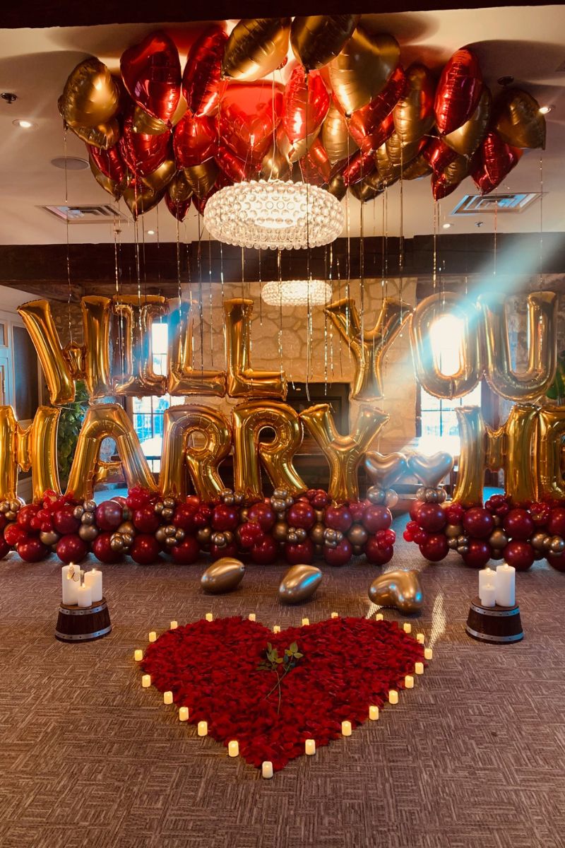 Will You Marry Me Letter Balloons Heart Balloons Red and Gold Candle and Heart-Shaped Flower Display | Majestic Balloons | Cambridge, Ontario